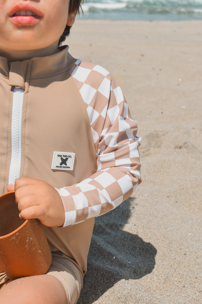 UPF 50 RASHGUARD ONESIE - DUNE CHECKERS